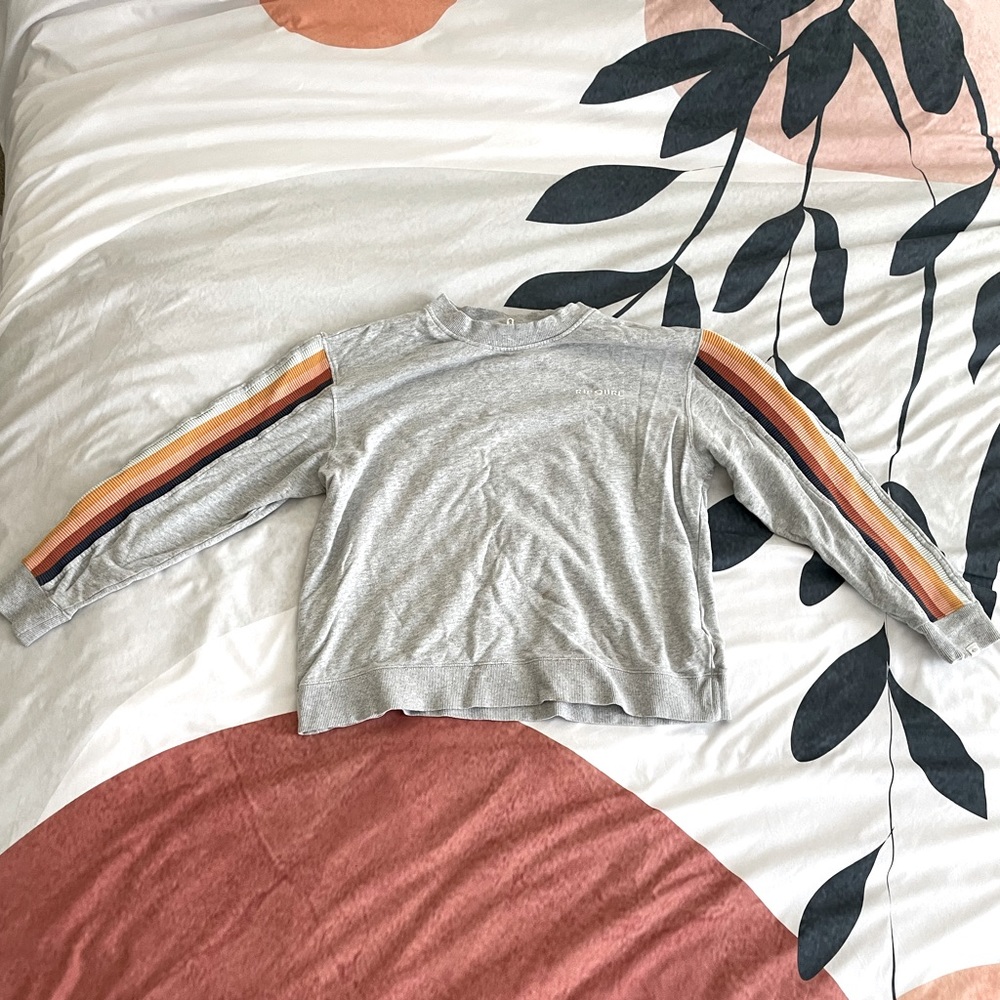 Gray Rip curl crew neck with rainbow arms
